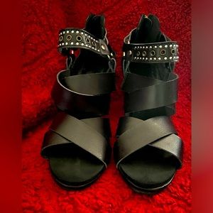 Black heels, silver studded, zipper heel, leathery straps, size 8